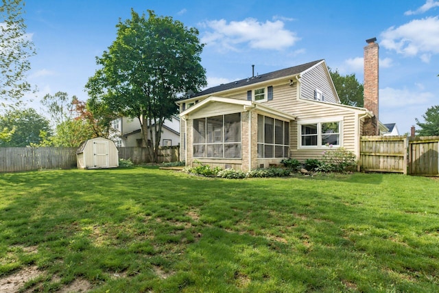 632 Bridgewater Ct, Westerville, OH 43081 - rear view of house featuring a sunroom, a storage shed, a chimney, and an outdoor structure