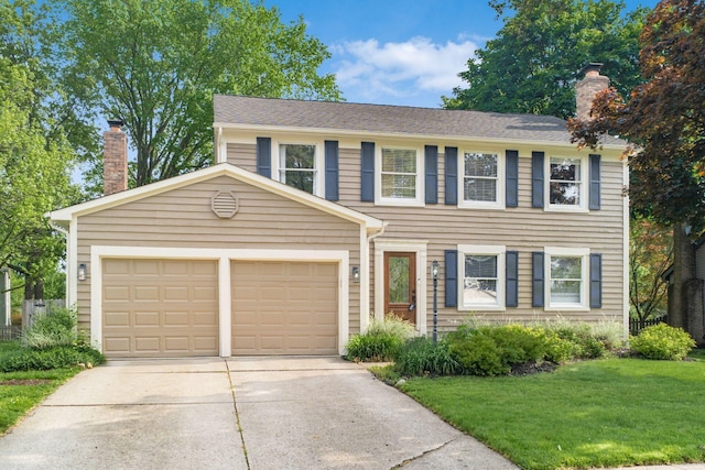 632 Bridgewater Ct, Westerville, OH 43081 - colonial inspired home featuring concrete driveway, a chimney, an attached garage, and a front lawn