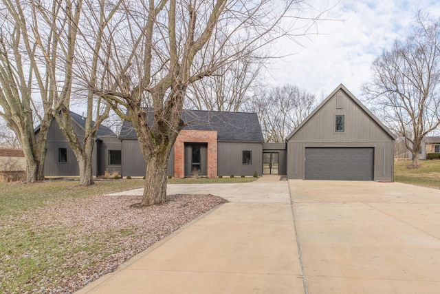 modern farmhouse style home featuring a garage