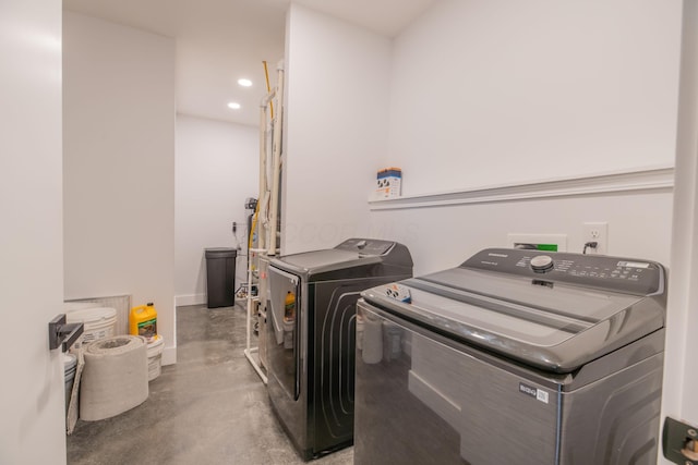 laundry area with washer and dryer