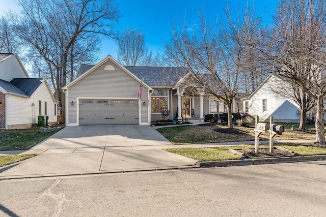 view of front of property featuring a garage