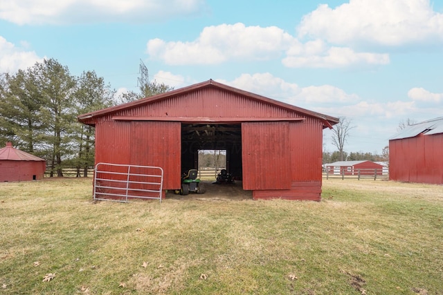 view of outdoor structure featuring a yard