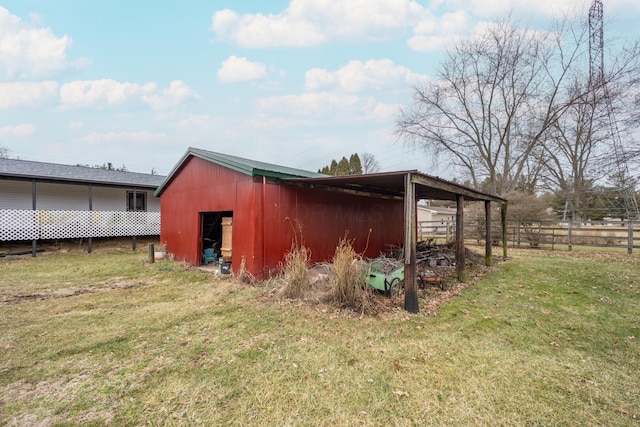 view of outdoor structure with a lawn