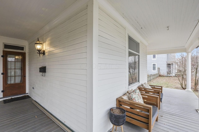 wooden terrace with covered porch