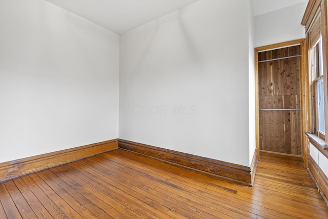 spare room with light hardwood / wood-style floors