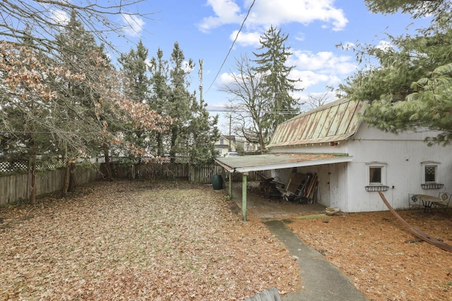 view of yard featuring a carport