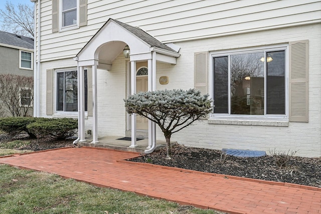 property entrance featuring a patio