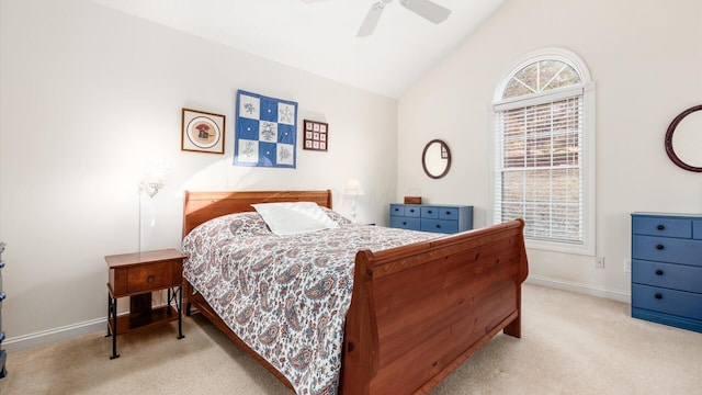 bedroom with baseboards, lofted ceiling, ceiling fan, and carpet flooring