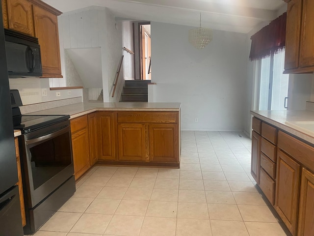 kitchen with stainless steel range with electric stovetop, decorative light fixtures, light tile patterned floors, kitchen peninsula, and beam ceiling