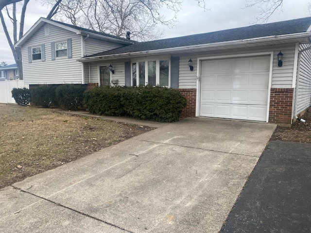 split level home featuring a garage