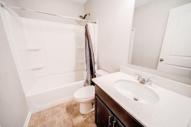 full bathroom featuring vanity, toilet, and shower / bath combo with shower curtain