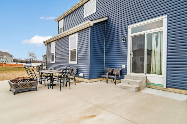 view of patio / terrace featuring a fire pit