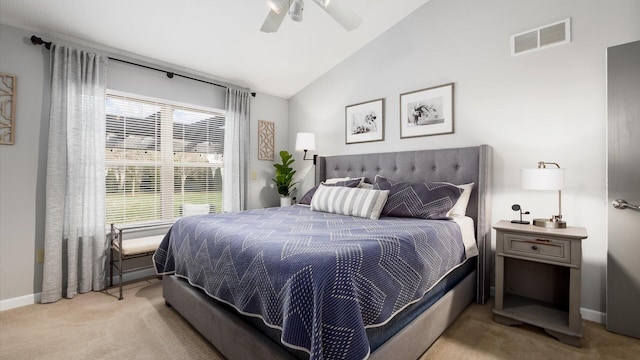 bedroom featuring lofted ceiling, light carpet, and ceiling fan