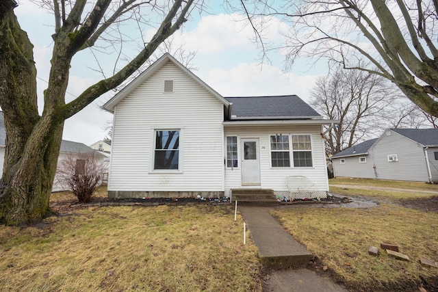 view of front of home with a front lawn