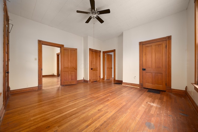 interior space featuring ceiling fan and light wood-type flooring