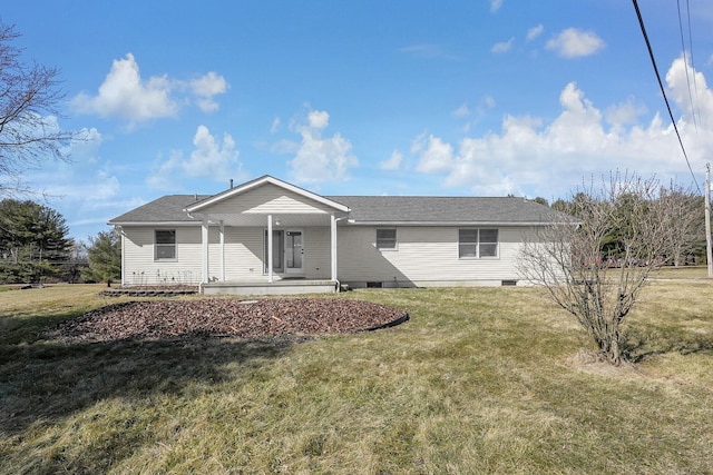 view of front of home with a porch and a front yard