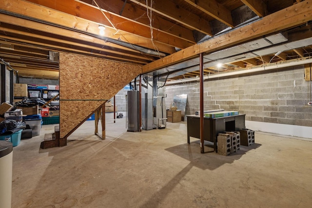 basement featuring heating unit and gas water heater