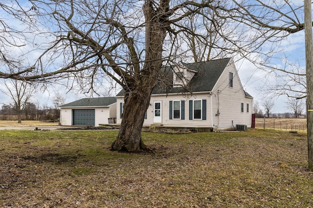 view of front of home featuring a garage and a front lawn