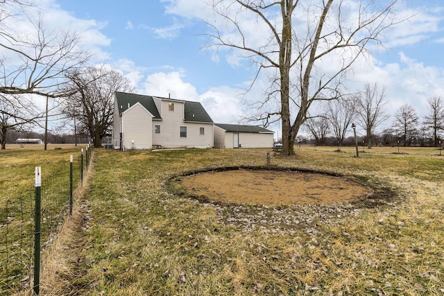 view of yard with a rural view