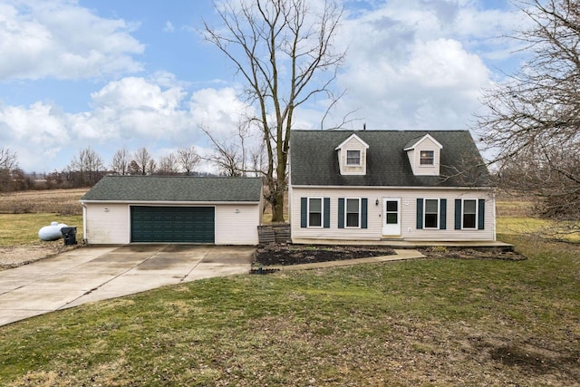 view of front of house with a garage and a front lawn