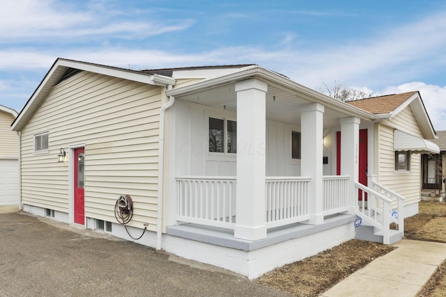 view of home's exterior featuring covered porch