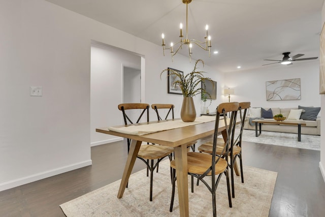 dining space featuring ceiling fan and dark hardwood / wood-style floors