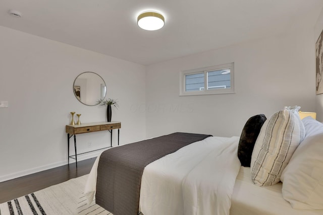 bedroom featuring wood-type flooring