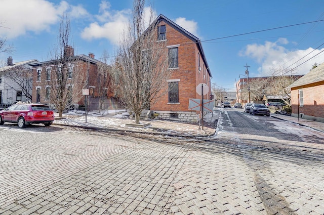 exterior space with curbs and sidewalks