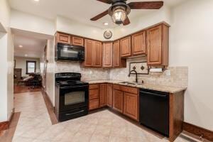 kitchen featuring tasteful backsplash, sink, ceiling fan, and black appliances