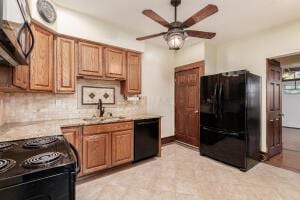 kitchen with tasteful backsplash, ceiling fan, sink, and black appliances