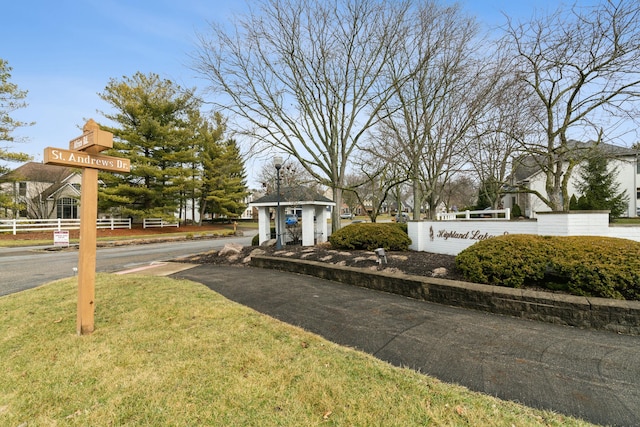 surrounding community featuring a yard