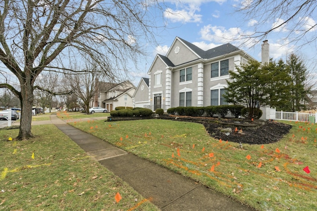 view of side of property with a yard