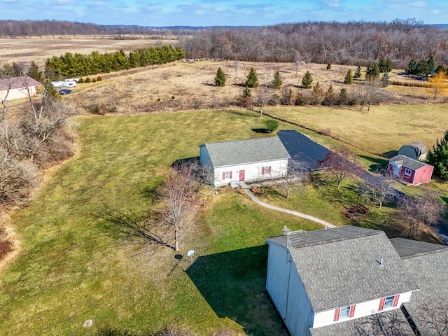 birds eye view of property featuring a rural view