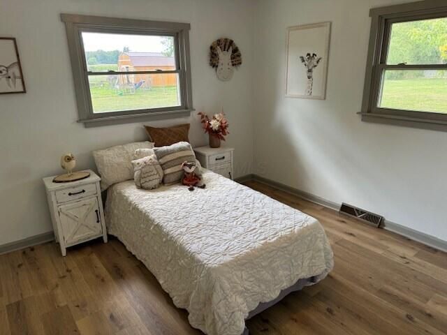 bedroom featuring hardwood / wood-style flooring