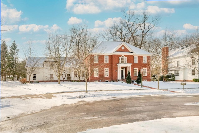 view of greek revival inspired property