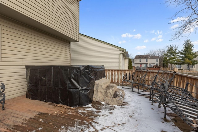 view of snow covered deck