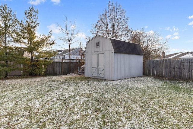 view of outbuilding with a lawn