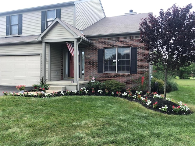 5037 Langcroft Dr, Hilliard, OH 43026 - traditional-style home with brick siding, an attached garage, and a front lawn
