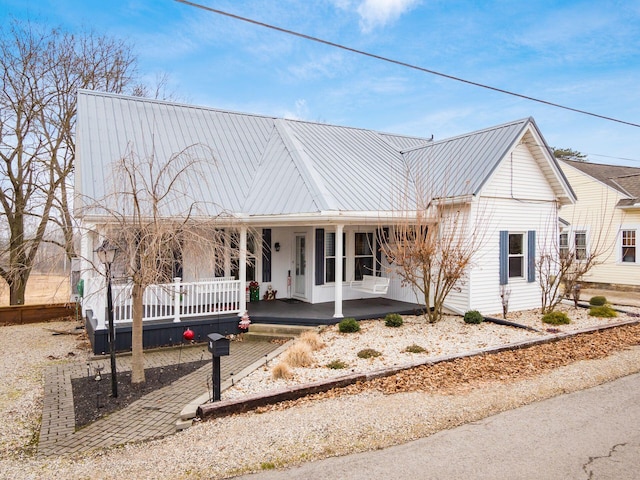 view of front of home featuring covered porch