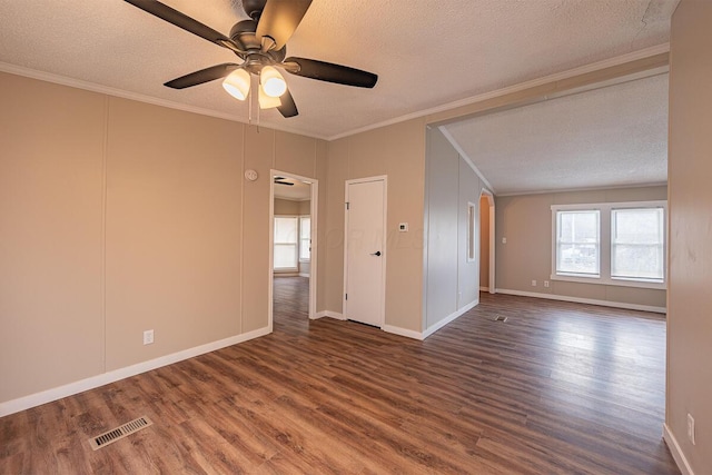 unfurnished room featuring ornamental molding, dark hardwood / wood-style floors, ceiling fan, and a textured ceiling