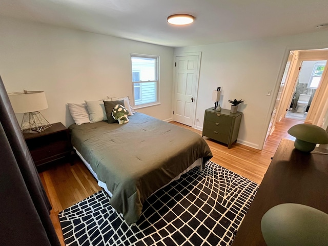 bedroom with light hardwood / wood-style flooring