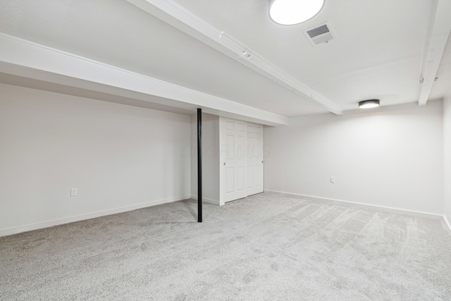 basement with light colored carpet