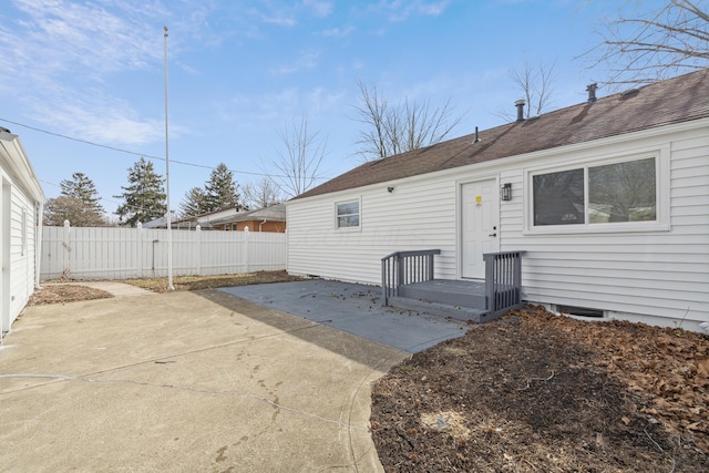 rear view of house with a patio