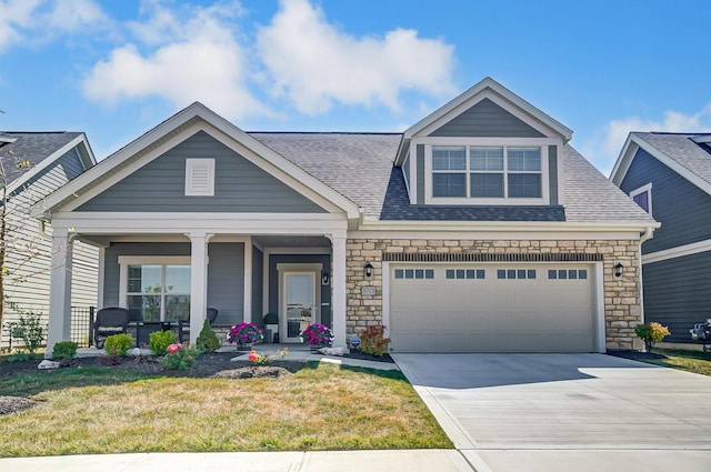 craftsman-style house with a front yard and a porch