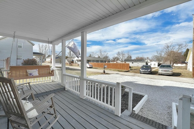 wooden terrace with a porch