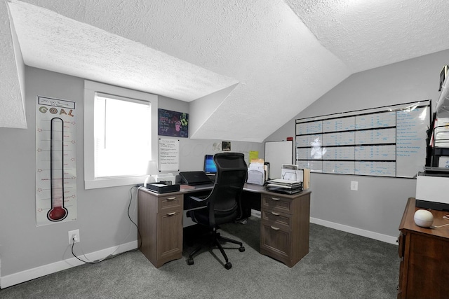 carpeted office space featuring lofted ceiling and a textured ceiling