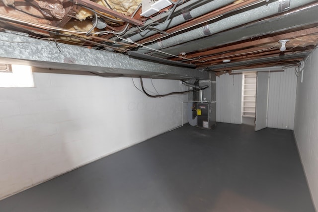 basement featuring heating unit