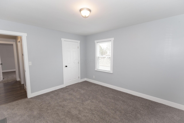 empty room featuring carpet flooring