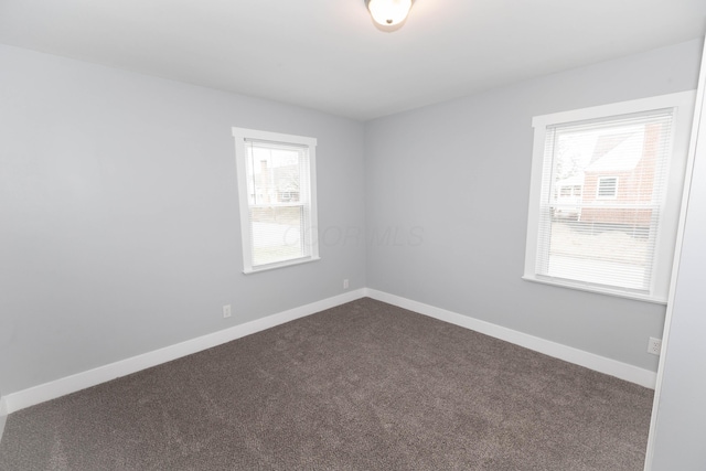 view of carpeted spare room