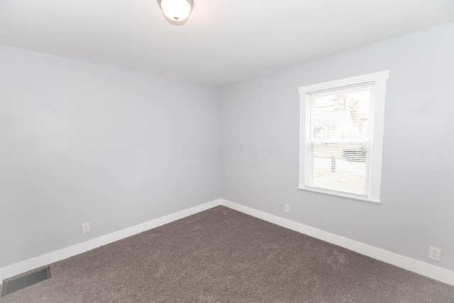 view of carpeted spare room